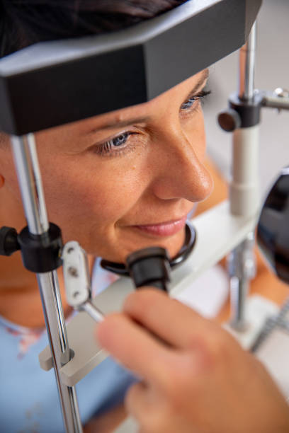 istock Woman portrait during eye exam 1443386757