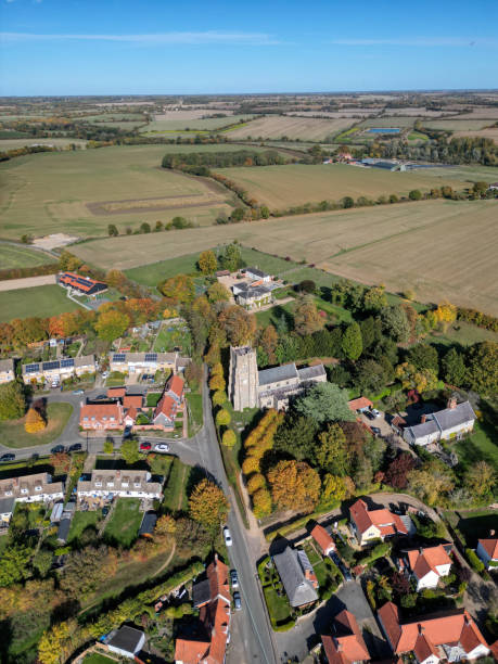 istock Monks Eleigh Church hill aerial view 1443388995