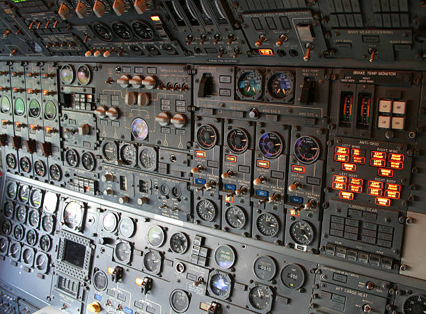 istock Closeup of an airplane cockpit's active controls 144338961