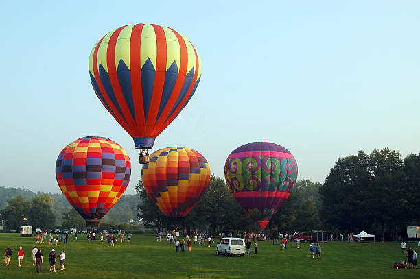 Hot Air Balloon Festival Hot air balloons at athe Pittsfield, New Hampshire hot air balloon festival ballooning festival stock pictures, royalty-free photos & images