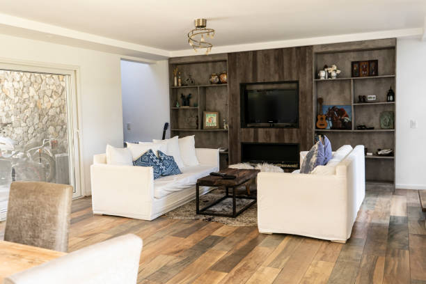 istock Trendy living room with two sofas, a bookcase and  coffe table. 1443393806