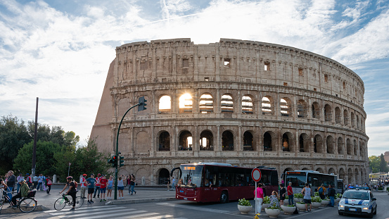 A low-angle shot of Colosseum in Rome, Italy in the evening