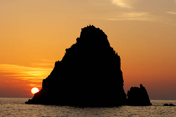 istock Rocky island and sunset 144339810