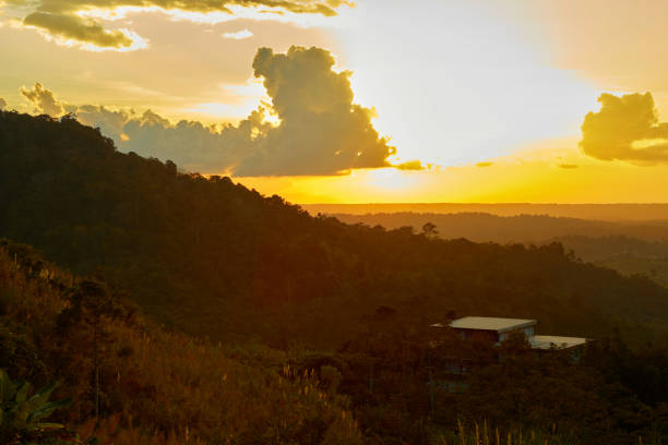 Sunset over the mountain with cloudy sky