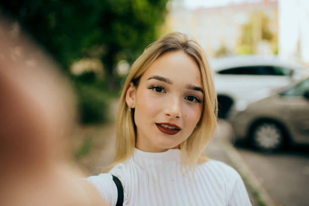 istock teenager girl using smart phone 1443401576