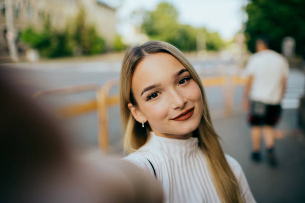 istock teenager girl using smart phone 1443401582