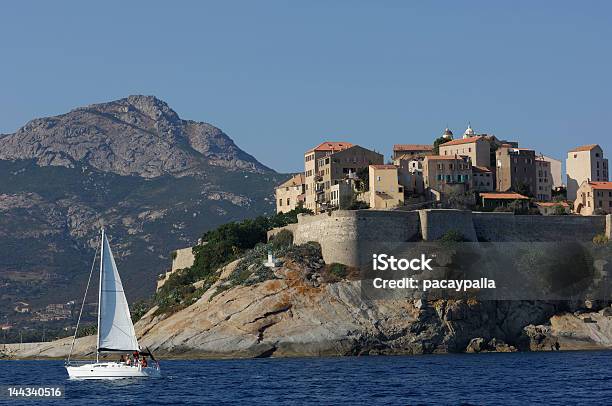 Calvi Village On The Sea With Sailing Boat Stock Photo - Download Image Now - Calvi, Corsica, Horizontal