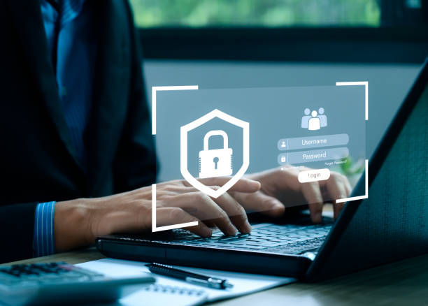 istock cybersecurity concept Businessmen protecting personal data on laptops and virtual interfaces. Lock icon and internet network security technology. Username and password 1443407279