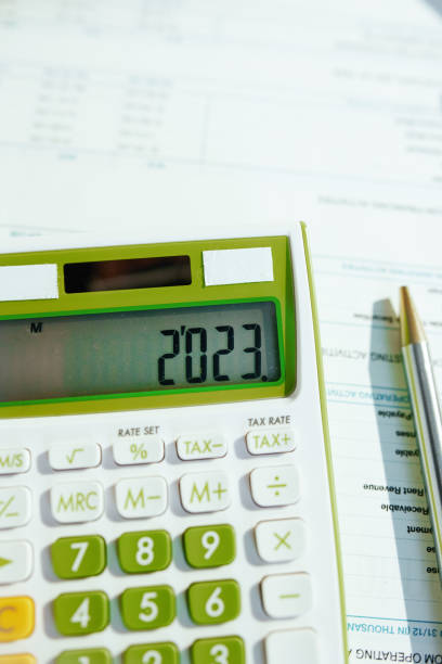 istock tax time. calculator and documents on desk 1443409640
