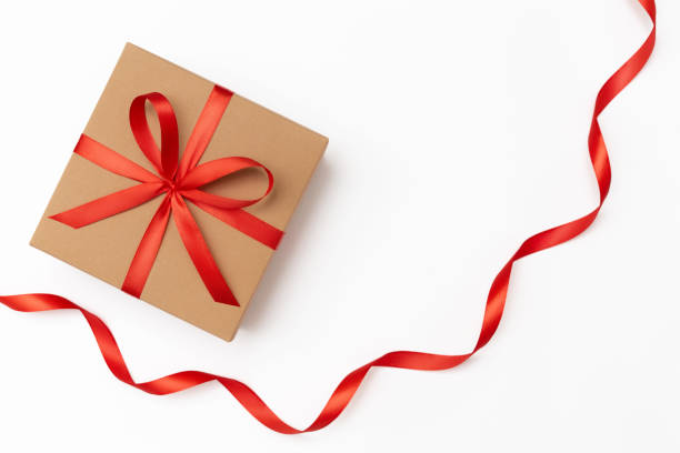 istock Craft present box with red bow and red ribbon on the white background 1443410658
