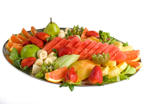 Colorful fruit salad catering platter with assorted fruits. Yumm... 