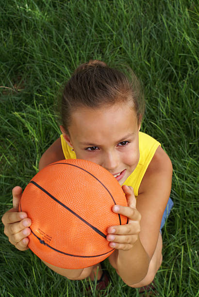 istock Girl with basketball 3 144342360