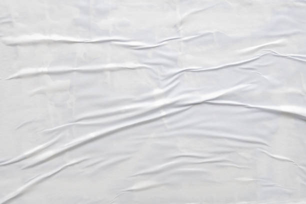 istock white crumpled and creased paper poster texture background 1443424808