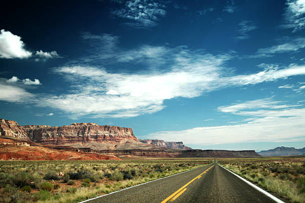 istock Landscape of a rocky mountain range and lonely road 144342520