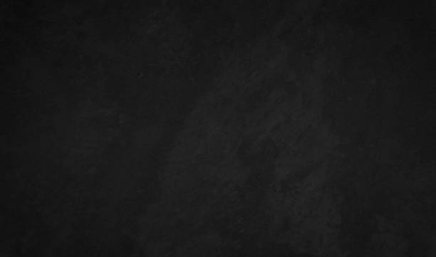 istock Black dark concrete wall background. Pattern board cement texture grunge dirty scratched for show anthracite promote product urban floor and abstract paper design element decor. Blackboard blank. 1443425411