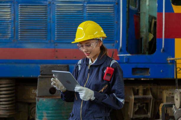 istock Portrait of Engineer in the process of inspecting train engines 1443428586