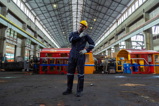 istock Portrait of Engineer in the process of inspecting train engines 1443428676