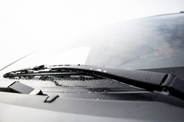 Wiper blades work when cleaning a car's windshield. High quality 4k footage