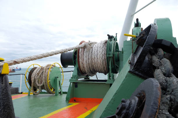Mooring crane ropes on marine boat drums. Deck mooring mechanism at the fore of the tanker.