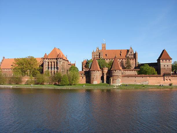 Malbork Castle Teutonic Knights Castle Malbork from XIII century. Gothic style. The biggest in Europe. A panoramic view of the Castle from the West malbork photos stock pictures, royalty-free photos & images