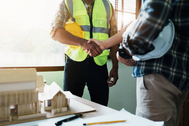 istock Engineers shaking hands to congratulate after success To create a building architecture successfully according to the goals that have been set 1443432222