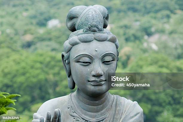 Female Statue In Front Of A Temple Providing Offerings Stock Photo - Download Image Now