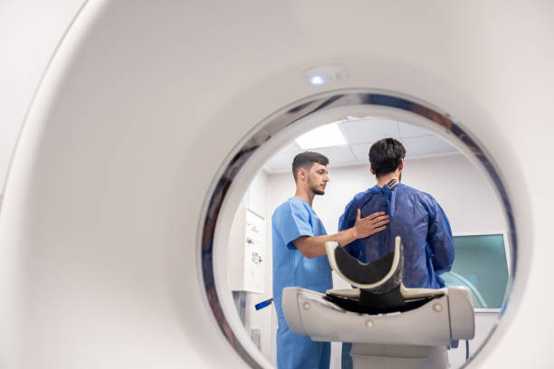 istock Radiologist getting a patient ready for an MRI at the hospital 1443435480