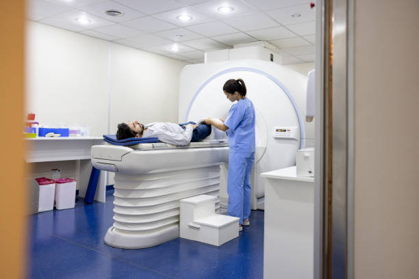 istock Radiologist getting a patient ready for an MRI at the hospital 1443435492