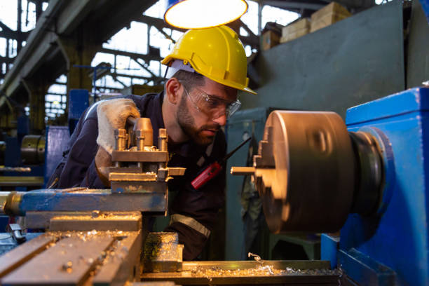 istock CNC turning engineering, workers, people, quality control, maintenance, factory inspection 1443435842