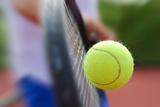 istock Tennis racket and ball 144343963