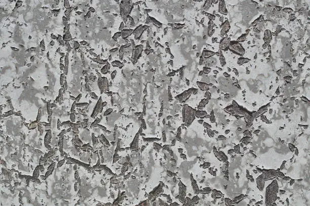 The surface of rough decorative sand-colored plaster