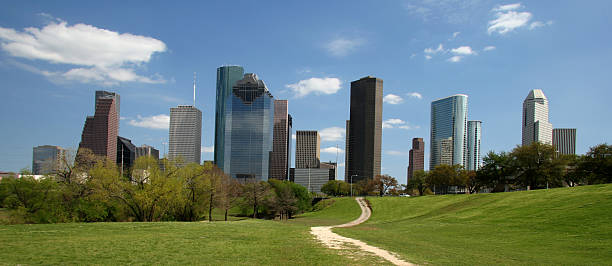 Path through the park leading to the heart of downtown stock photo