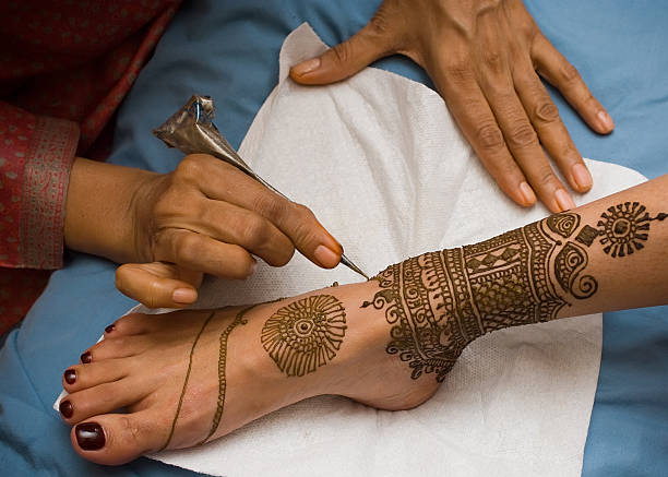Henna session stock photo