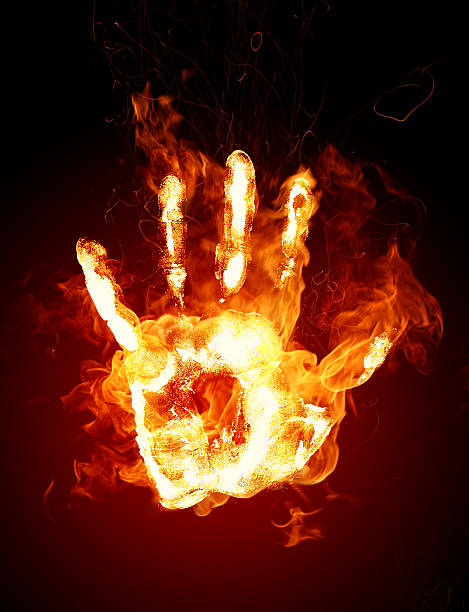 istock A handprint made of fire and flames 144344133
