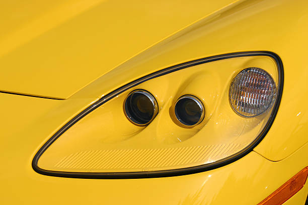 istock Yellow sports car headlight 144344224