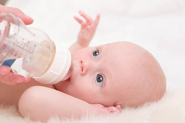 istock A young baby being fed with a bottle 144344285