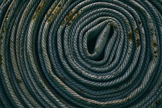 istock Close up Old Fire Hose Texture Background in Dark Tone, Suitable for Safety Concept. 1443446576