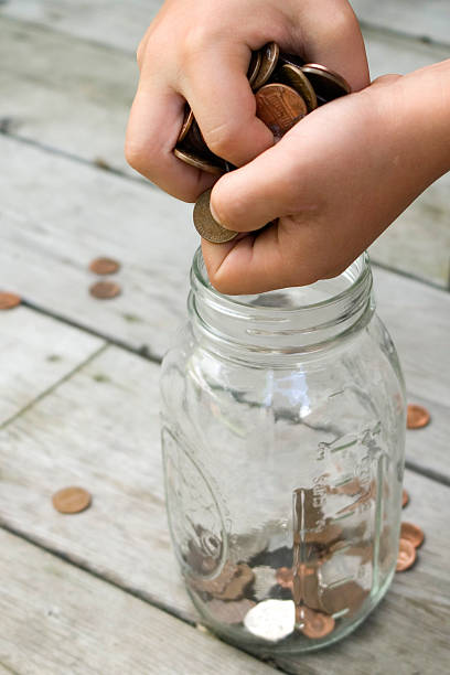 istock Fist full of change 144345328
