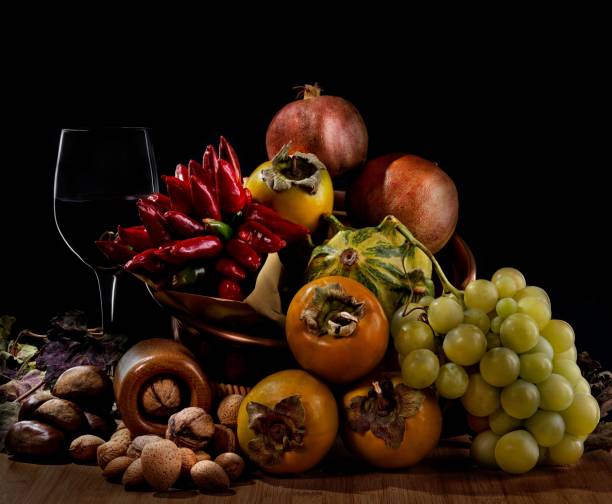 istock Beautiful composition of different fruits and vegetables under dramatic lighting 1443454919
