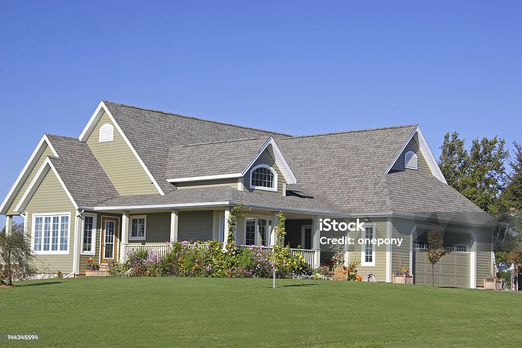 High End Home A new executive home with landscaped grounds. Architecture Stock Photo