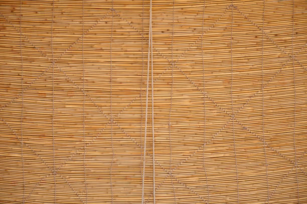istock Brown bamboo blinds texture and seamless background. Bamboo stick straw mat texture. 1443456568