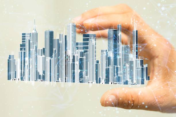 istock 3D rendered city buildings hovering in man's hand 1443456667
