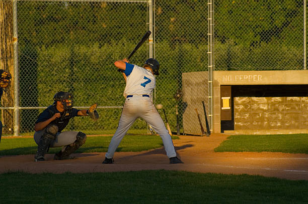 istock Baseball Player at bat watches a ball 144345698