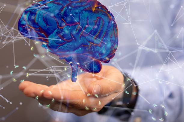 istock Businessman presenting the 3D rendered blue brain in cyberspace - concept of artificial intelligence 1443457080