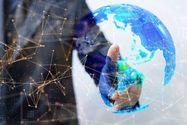 istock Finger touching an illustration of a globe- global networking concept 1443458587