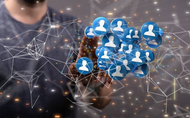 istock Man displaying an illustrative digital network graph - concept of online connection and community 1443459119