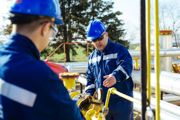 istock Male worker inspection visual pipeline oil and gas 1443462290