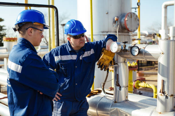 istock Male worker inspection visual pipeline oil and gas 1443462759