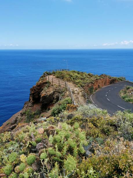 Vertical shot of road near Los Nogales beach on the island of La Palma, Canary Islands, Spain A vertical shot of road near Los Nogales beach on the island of La Palma, Canary Islands, Spain nogales arizona stock pictures, royalty-free photos & images