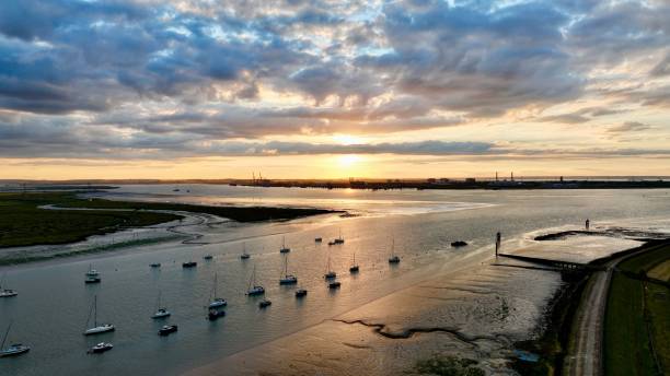 istock Beautiful shot of ships in a row under a cloudy sky 1443464212